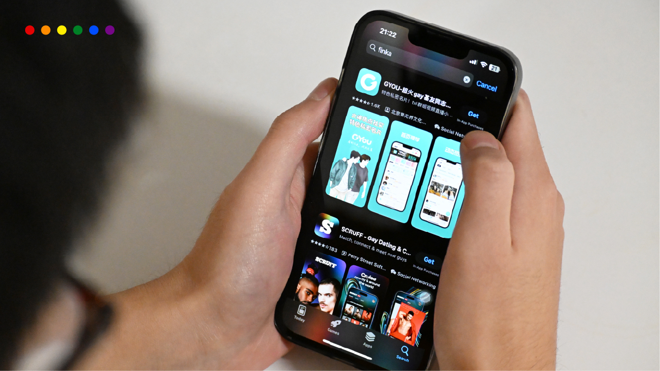 A close-up shot of a person holding an iPhone displaying the App Store search results for "finka" - gay dating app in China. However Finka has been removed under official order.